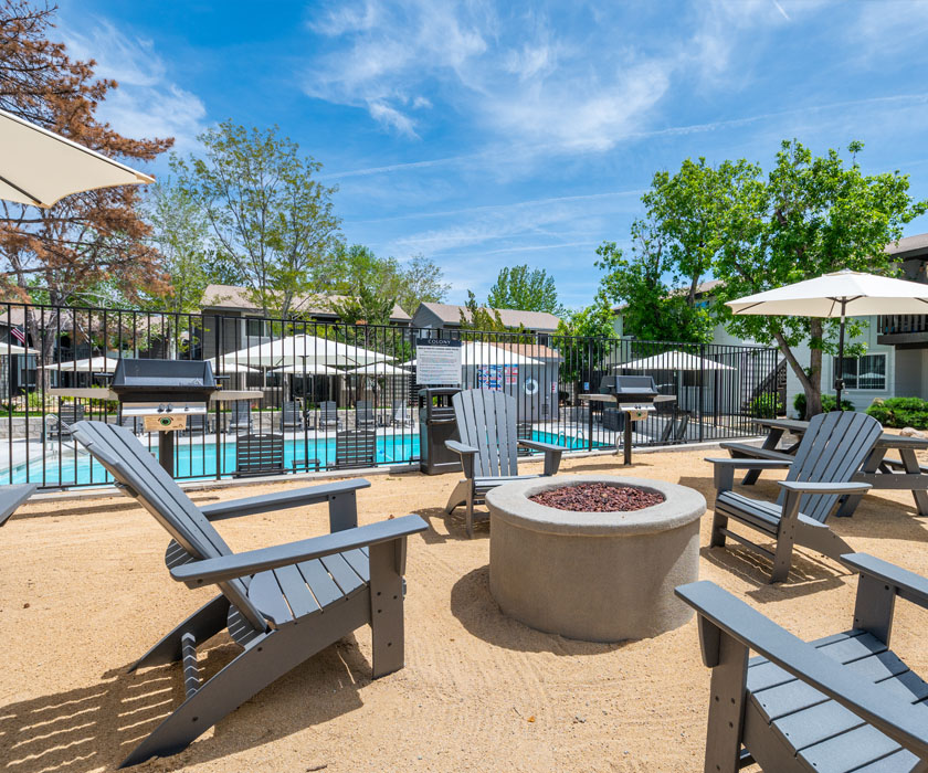 Outdoor BBQ Area with Grills & Seating